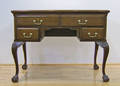 Chippendale style walnut desk with cabriole legs ending in ball and claw feet