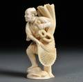 Ivory Okimono of a Fisherman with a Net