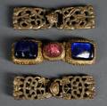 Three Belt Buckles