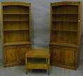 Pair of Drexel Triune Mahogany and Mahogany Veneer Bookcases and an End Table