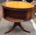 Regencystyle Mahogany Veneer and LeatherInset Bookshelf Drum Table