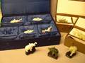Two Pairs of Cased Chinese Carved Jade Elephant Figures and a Set of Five Chinese Carved White Jade Elephant Figures