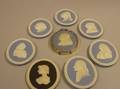 Seven Wedgwood Solid Light Blue Jasper and One Dark Blue Portrait Medallions