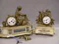 Two French Giltmetal Figural and Alabaster Mantel Clocks