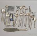Group of Silver and Porcelainhandled Flatware and Serving Items