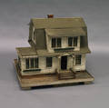 White Paneled Gambrel Cape House Model
