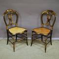 Pair of Victorian Rococostyle Giltdecorated Rosewoodgrained Wood Side Chairs with Caned Seats