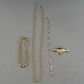 Four Gold Jewelry Items