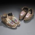 Two Pairs of Cheyenne Partially Beaded Hide Moccasins