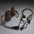 Old Horsehair Bridle and Pair of Brassstudded Leather Cowboy Cuffs