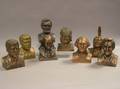 Eight Cast Metal Bust Banks
