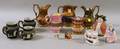 Five Copper and Pink Lustre Jugs Three Dudson Black Jasper Dip Jugs a Toby Jug Two Small Bisque Figures a Figural Trinket Box and