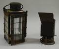 Blackpainted Tin Kerosene Lantern with Red Glass Panel and a Blackpainted Iron and Glass Candle Lantern