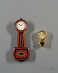 Miniature E Howard Regulator by Foster Campos and a Brass Miniature Wall Clock