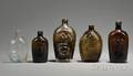 Five Colored Glass Flasks