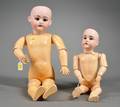 Two Bisque Head Dolls