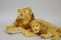 Two Steiff Mohair Recumbent Male Lions and a Steiff Mohair and Plush Dachshund