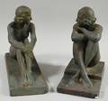 American School 20th Century Pair of Plaster Bookends of Seated Female Nudes