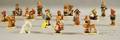 Fourteen Hummel Porcelain Figures and a White Cat Figure
