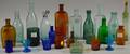 Group of Aqua and Colored Molded Glass Bottles and Glass Items