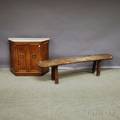English Elmwood Dshaped Bucket Bench with Splayed Legs and a Baroquestyle Marbletop Fruitwood Side Cabinet