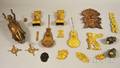 Seventeen Giltmetal and Bronze Ornamental Mounts and Two Clock Pendulums