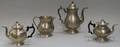 Three Pewter Teapots and a Pitcher