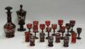 Bohemian Etched Ruby Flash Art Glass Decanter and Nineteen Cordial and Wine Stems