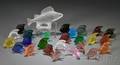 Twentyfive Lalique Fish Seals and a Lalique Fish Sculpture