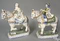Pair of faince horse and rider figures