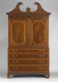 New York Federal mahogany linen press ca 1790 in 3 parts with a swans neck pediment with turned rosettes above an upper section with 2 tiger maple inlaid doors above a base with 4 similarly inlaid drawers all resting on straightbracket feet 91