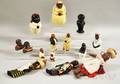 Eleven Black Americana Figural Items and Three Cloth Dolls
