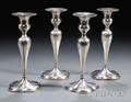 Four Silver Candlesticks
