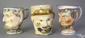 Two pearlware face mugs