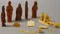 Ten Asian Ivory Articles and Five Carved Wood Figures