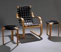 Alvar Aalto Blackleather Upholstered Blonde Bentwood Armchair and a Pair of Black Leather Upholstered Blondewood Fanleg Stools