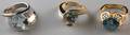 Three Contemporary Gold Blue Stone and Diamond Rings