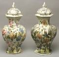 Near Pair of Continental TinGlazed Earthenware Covered Vases