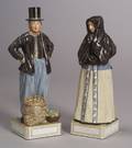 Two Royal Copenhagen Porcelain Figures of Townspeople