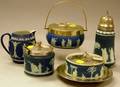 Wedgwood Dark Blue Jasper Dip and Silver Plate Mounted Box Caster Jam Pot Box and Undertray and a Small Jug