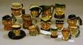Fourteen Small Midsize and Miniature Royal Doulton Character Jugs and Smoking Item
