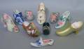 Collection of Ten Decorated Ceramic Figural Shoes