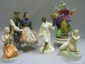 Five Handpainted and Glazed Porcelain Figural Groups