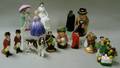 Fourteen Assorted Small Royal Doulton Porcelain Figures and Toby Jugs