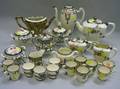 Twentythree Silver Overlay White Glazed Porcelain Tea and Coffeeware Items