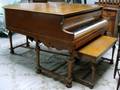 Small Player Piano with Veneered Case bench and listing of songs