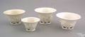 Four Chinese blancdechine magnolia cups late 17th c