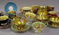 Thirtysix Piece Assembled Aynsley Gilt Handpainted and Transfer Fruit and Floral Decorated Porcelain Partial Tea Service