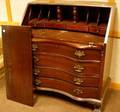 Chippendalestyle Carved Mahogany Serpentine Slantlid Desk