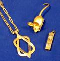 Two Gold Judaic Pendants and a Mouse Pin